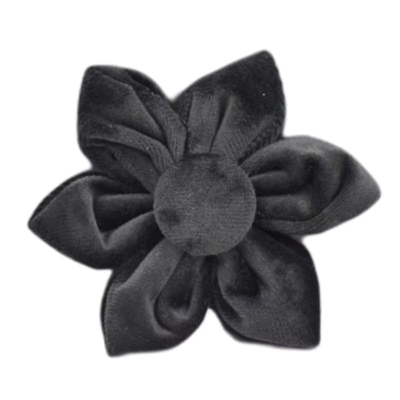 Black velvet flower accessory with layered petals and center knot