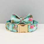 Floral dog collar with teal base and bowtie, gold buckles and metal ring