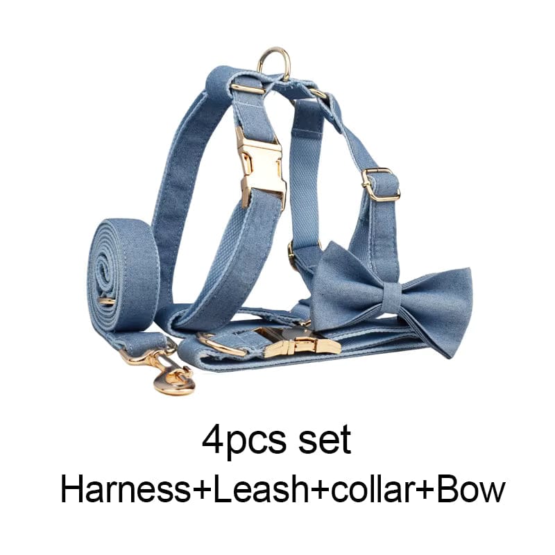 Blue denim dog harness with bow tie and matching leash with gold hardware