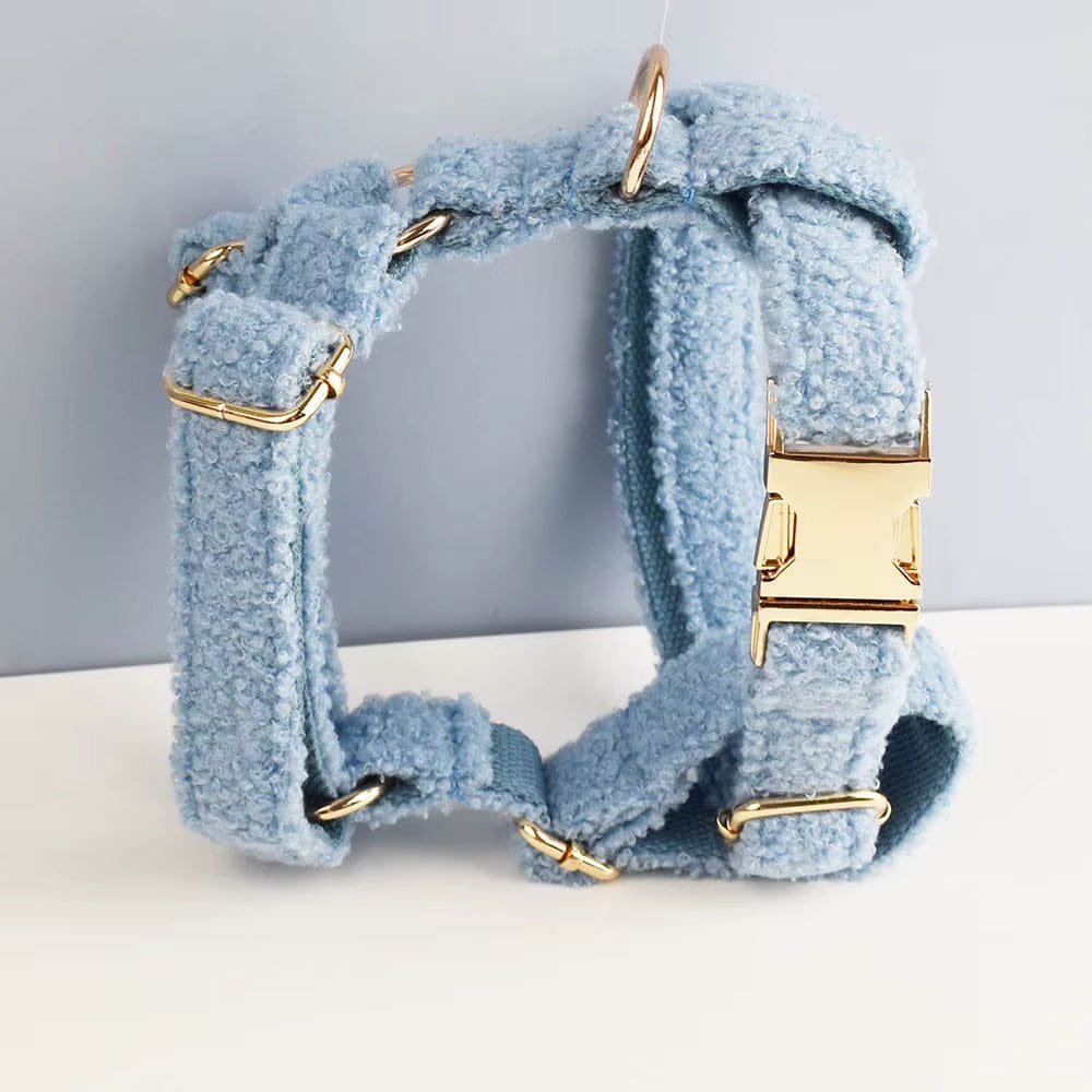Light blue teddy pet harness with gold metal buckles and side rings