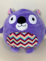 Large purple plush cuddler with big eyes and rainbow belly panel, squishy design