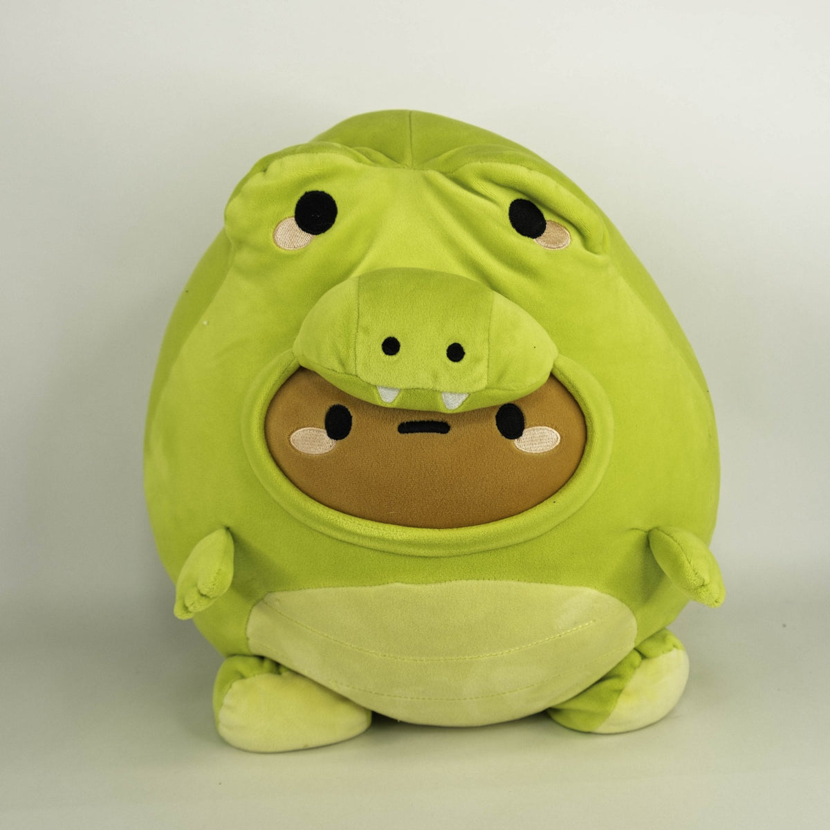 Large lime green plush pet toy with crocodile belly face, squishy body