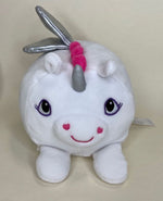 White unicorn plush squishy pet toy with purple eyes, pink cheeks, and silver horn