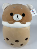 Large squishy plush pet toy, tan and cream cat-like head with paws and patterned body