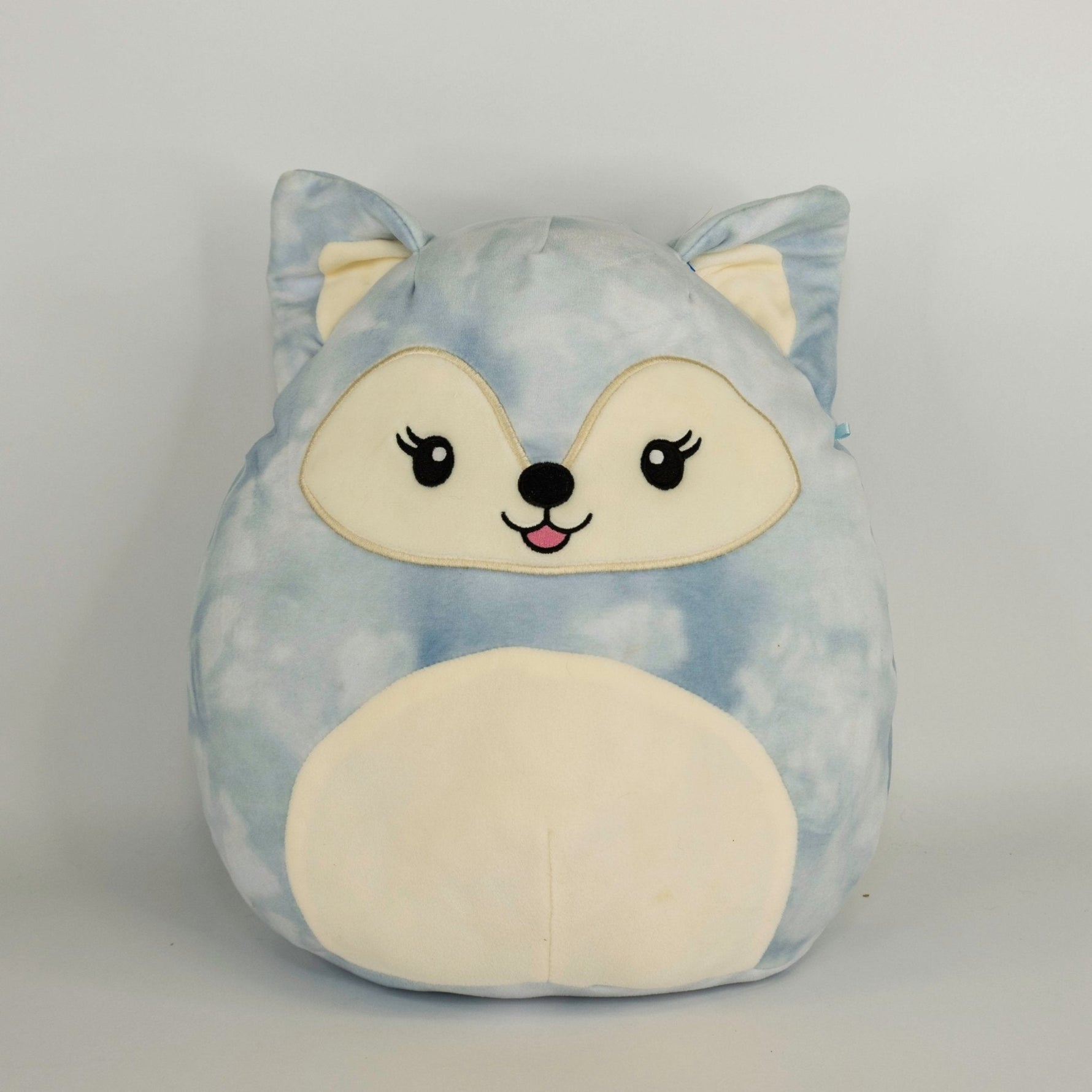 Large light blue cat plush pet toy with cream muzzle, big ears, and squishy body