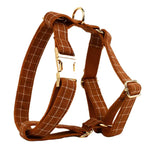 Brown plaid dog harness with gold hardware and front buckle