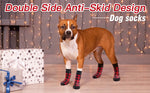 Dog wearing red and black plaid anti-skid socks with paw-print grip soles