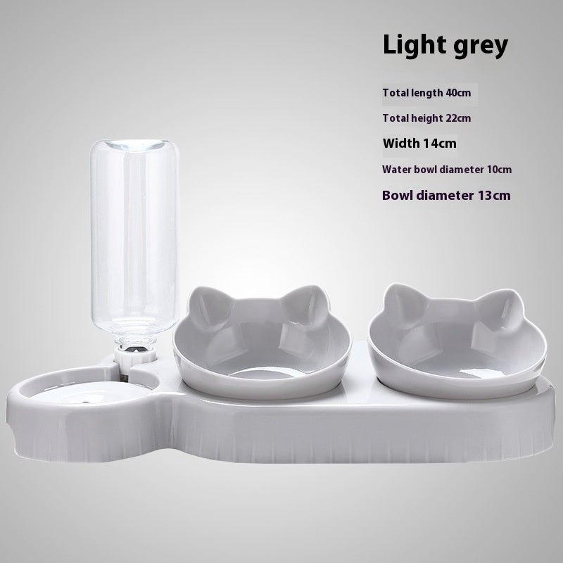 Light grey pet feeding station with auto water dispenser and two raised food bowls