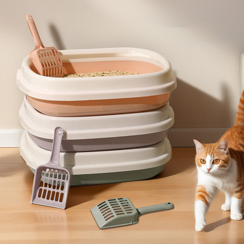 Anti-splash litter box with scoop, stacked white and gray trays with tan litter