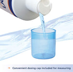 Water conditioner pouring into a measuring cup; convenient dosing cap included