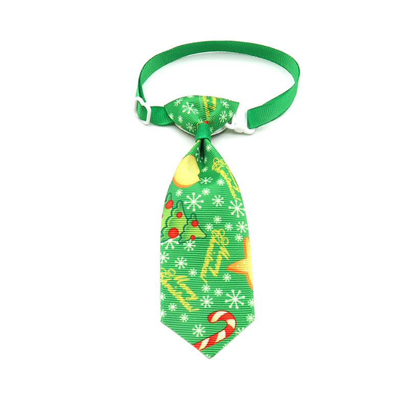 Green Christmas pet tie with gingerbread and candy patterns, clip-on strap