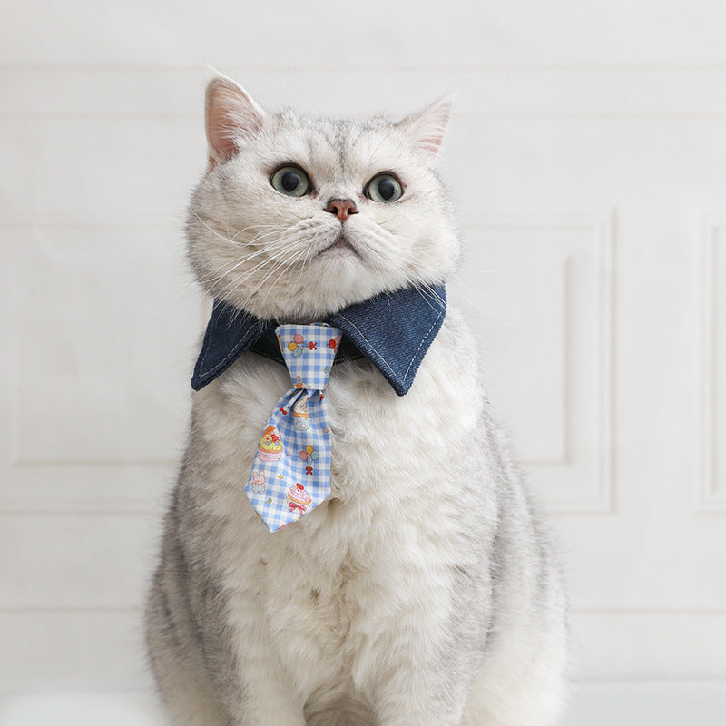 Cat collar with denim bow and blue patterned tie, centered
