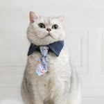 Cat collar with denim bow and blue patterned tie, centered