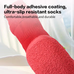 Red anti-slip dog sock with smooth knit top and textured paw-grip sole.