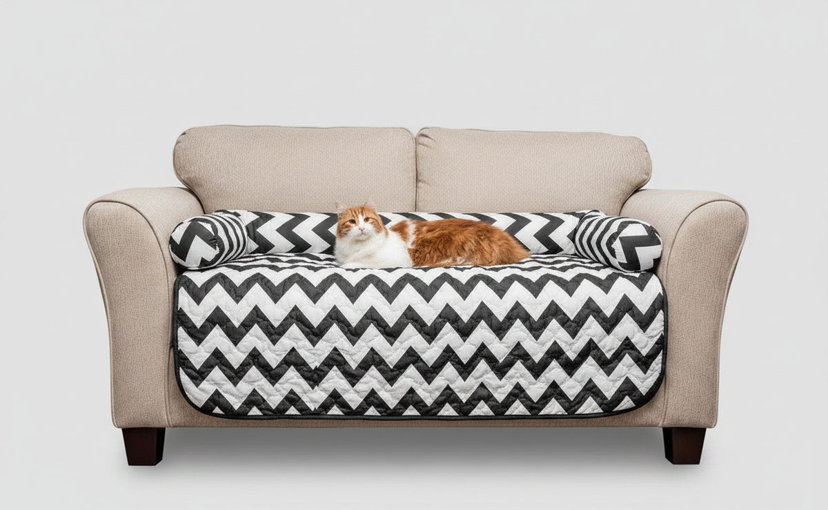 Reversible pet bed and chair cover set with black-and-white chevron quilt front