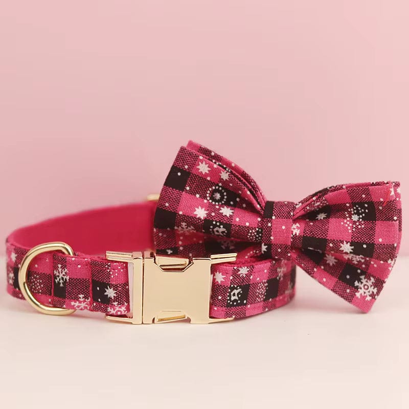 Red and black plaid dog collar with star-pattern bowtie and gold buckle hardware