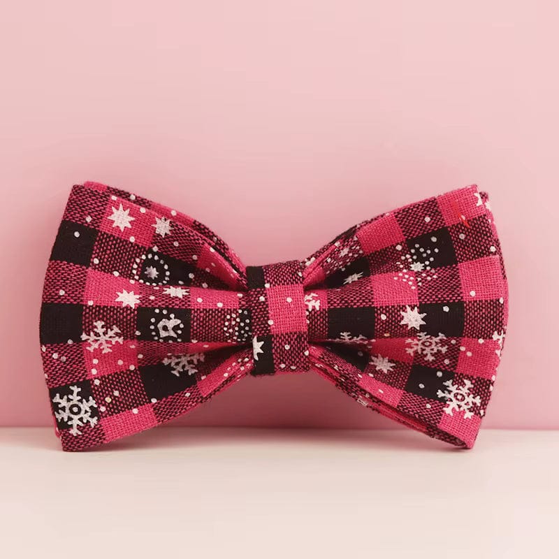 Red plaid bowtie with star and snowflake motifs on matching fabric knot