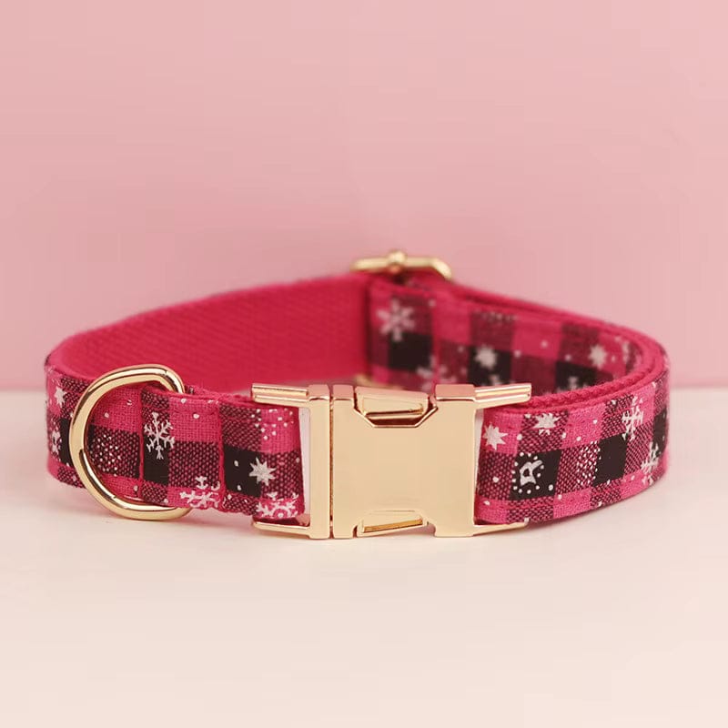 Red plaid dog collar with star motifs, gold buckle, and D-ring hardware