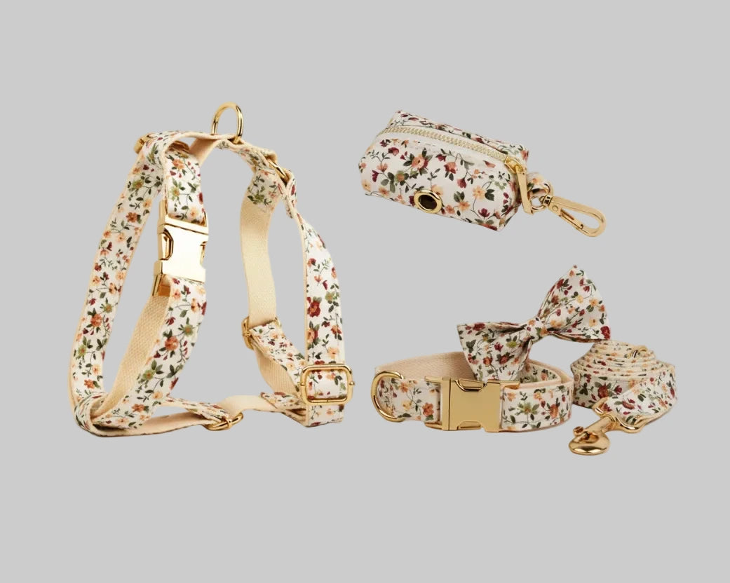Ivory floral dog set with collar, harness, leash, bowtie, and matching poop bag holder