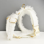 White ruffled dog collar, leash, and harness set with gold-tone hardware