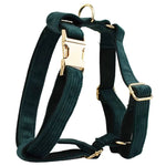 Dark green corduroy dog harness with gold-tone buckles and front strap