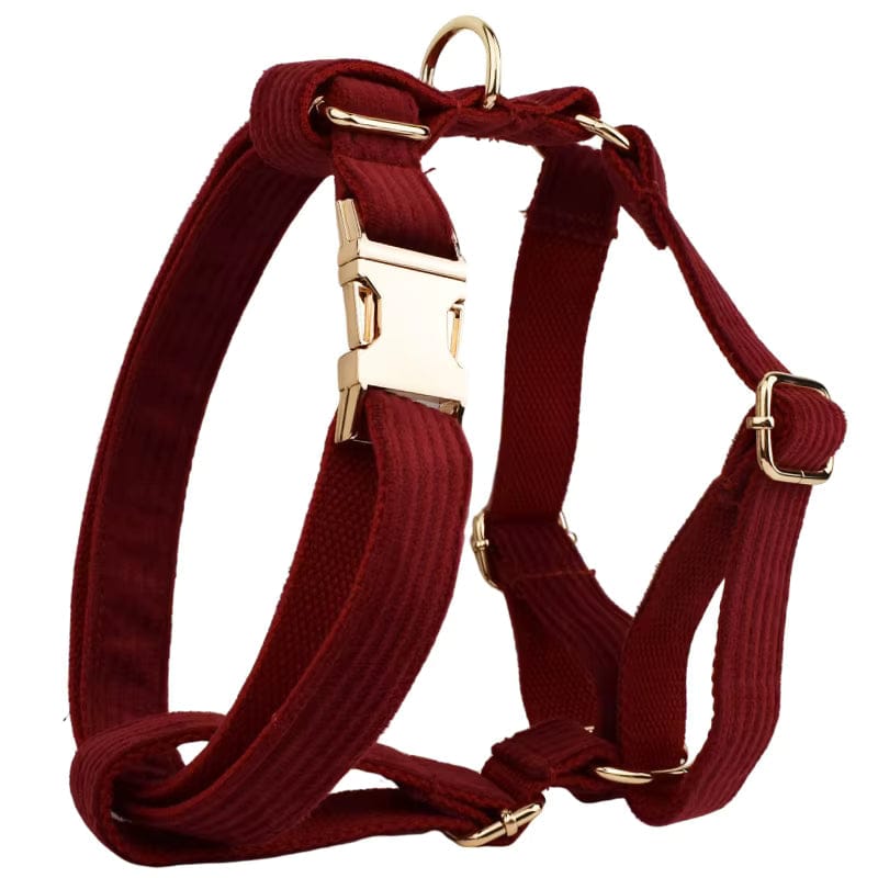 Dark red corduroy dog harness with gold-tone buckles and metal rings