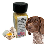 Quail egg food topper bottle with black cap, white label, quail eggs and dog