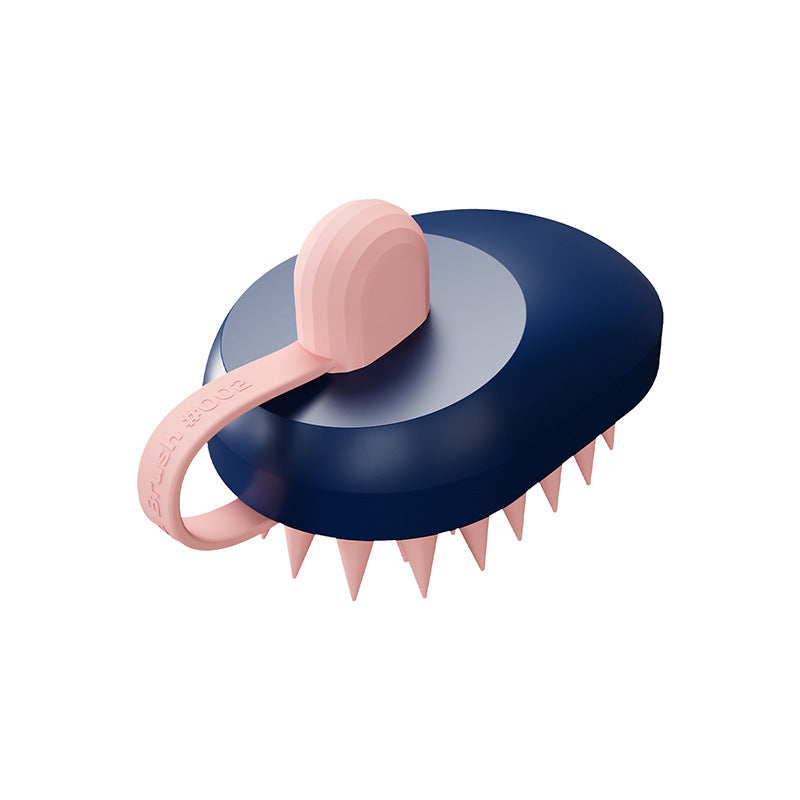 Silicone pet hair remover comb with dark blue body and pink bristle head, compact grooming brush