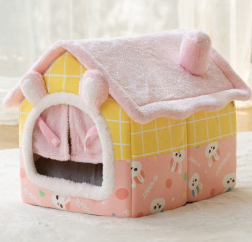 Pink and yellow enclosed pet house bed with plush hood-style door and roof blanket