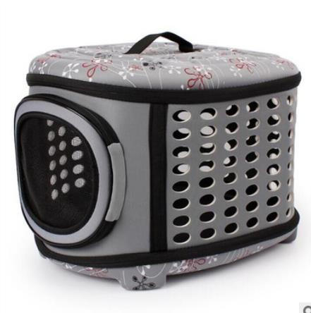 Foldable pet carrier handbag in gray with perforated side panels and mesh window