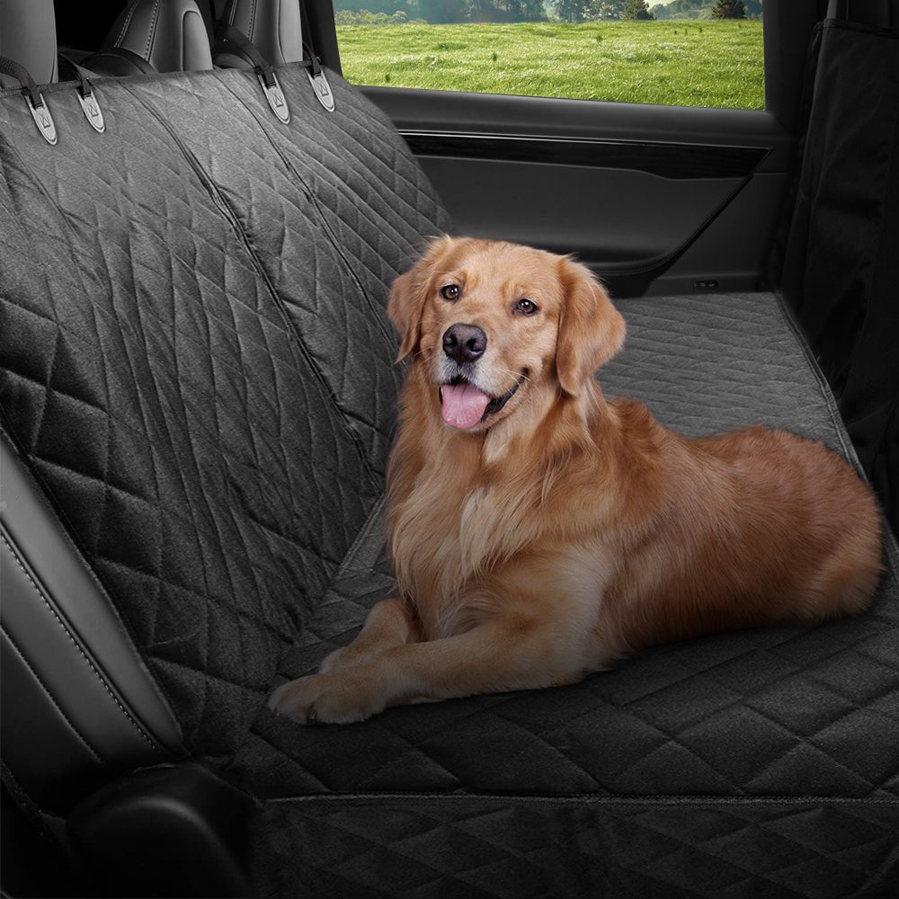 Black waterproof pet seat cover with quilted padding and anti-slip backing for rear seat