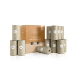 Premium dog waste bag box with folded roll and several light beige refill rolls