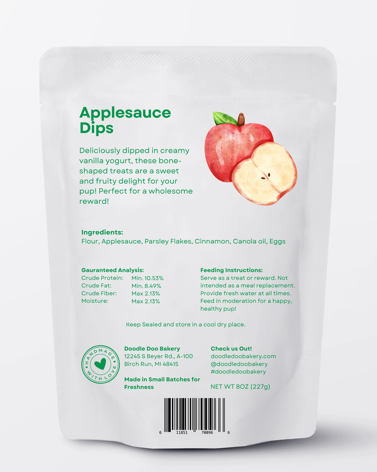 Dog treat pouch back view with ingredients list and apple graphic, net 8 oz (227 g).