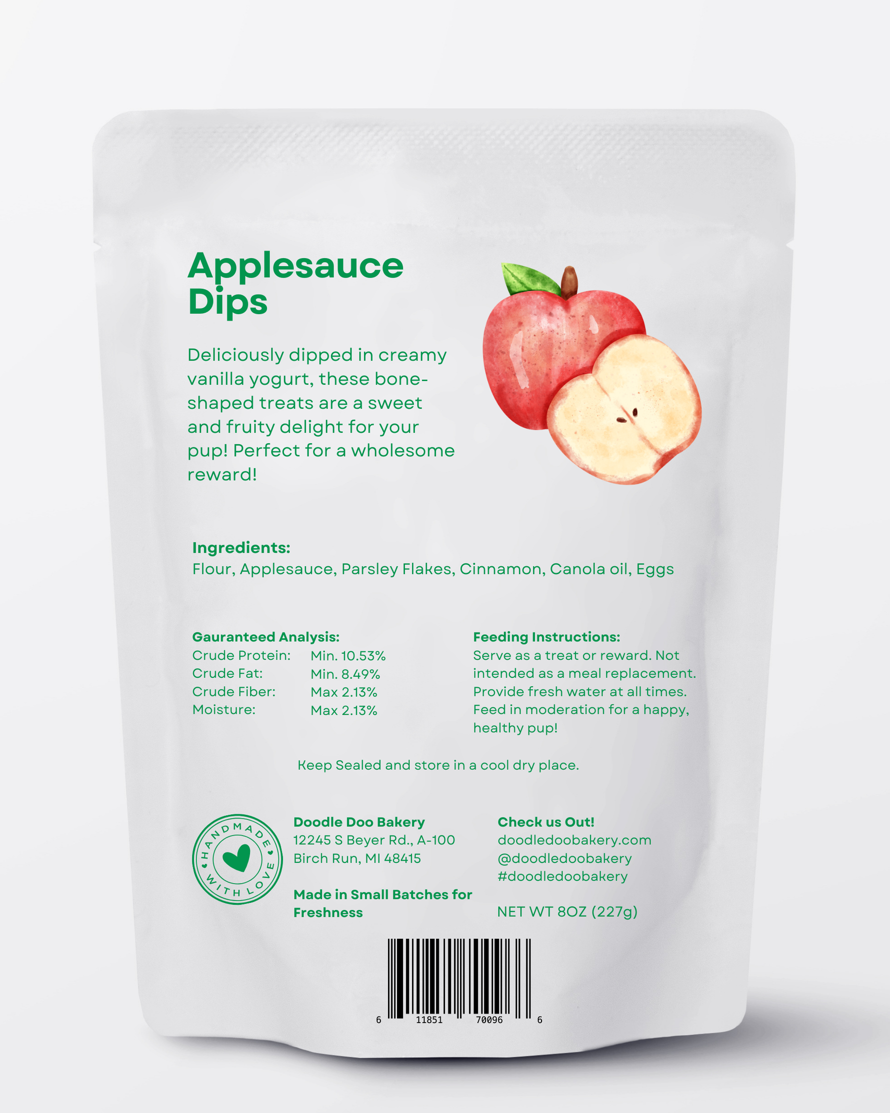 Dog treat pouch back view with ingredients list and apple graphic, net 8 oz (227 g).