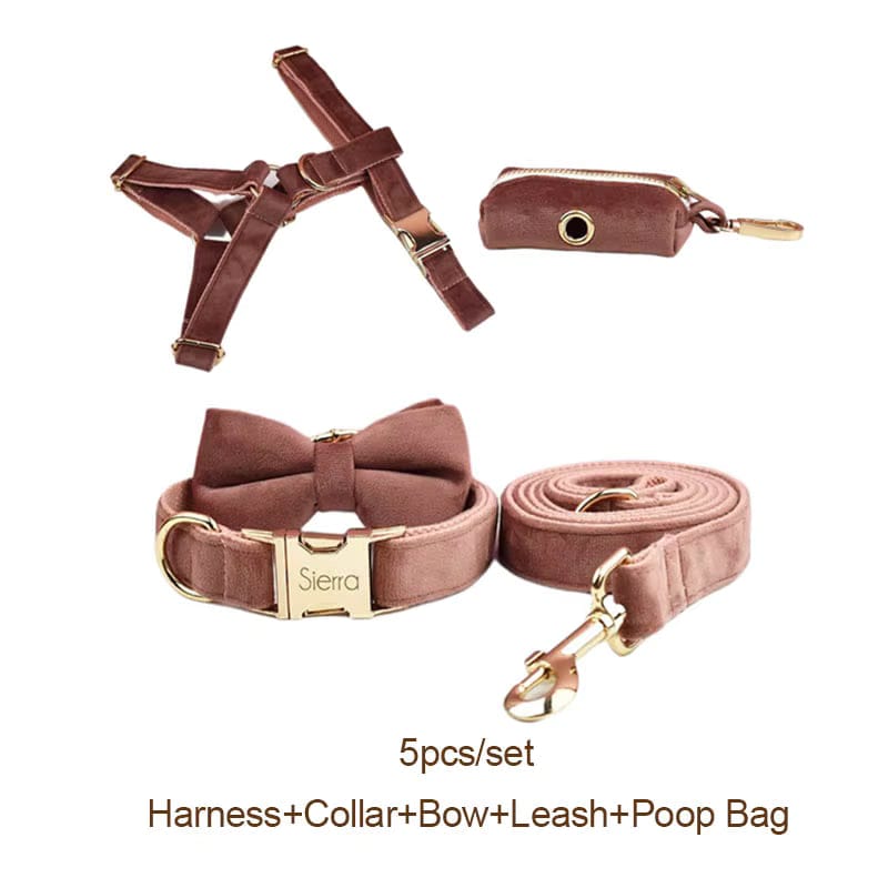 Dusty pink velvet pet bundle with harness, bow collar, leash, and poop bag pouch.
