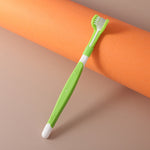 Light green three-sided pet toothbrush with white base and bristled head