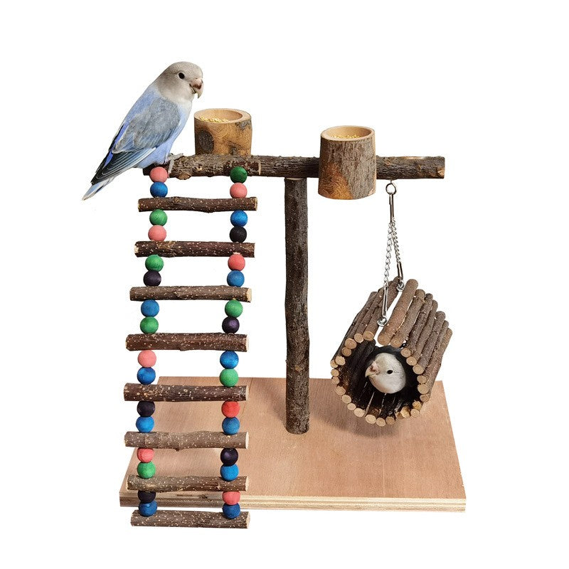 Wood parrot training station with beaded ladder, hanging hand toy, and two wood cups.