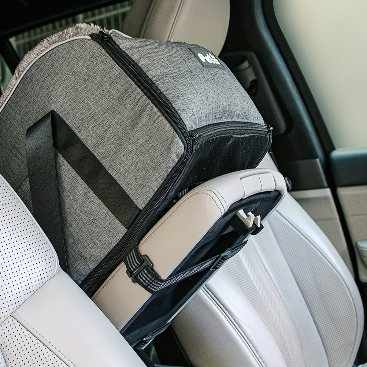 Grey pet car seat carrier with side panel, zipper opening, and seat-belt attachment