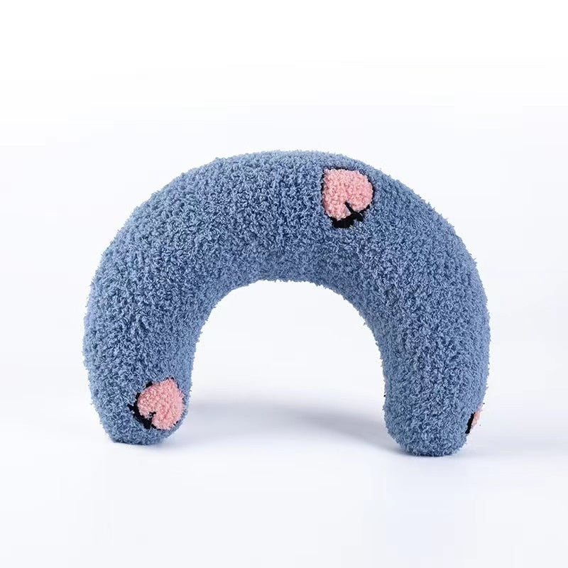 Blue plush U-shaped cat pillow toy with small pink paw patches