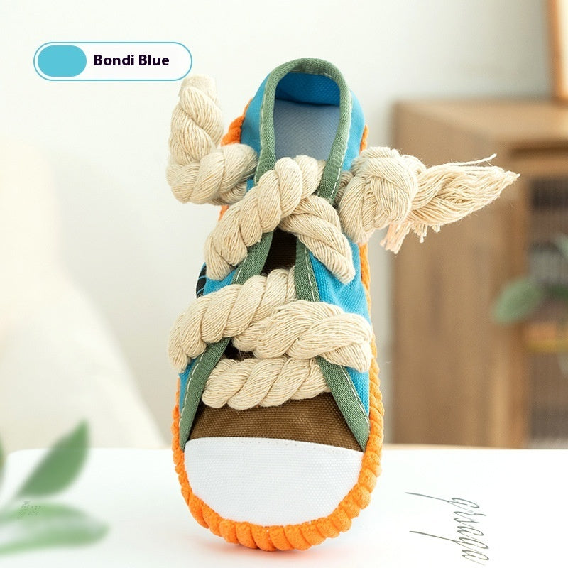 Bondi Blue squeaky plush shoe dog toy with blue upper, green straps, and rope knots