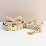Beige teddy dog collar, leash, and bow tie set with gold hardware
