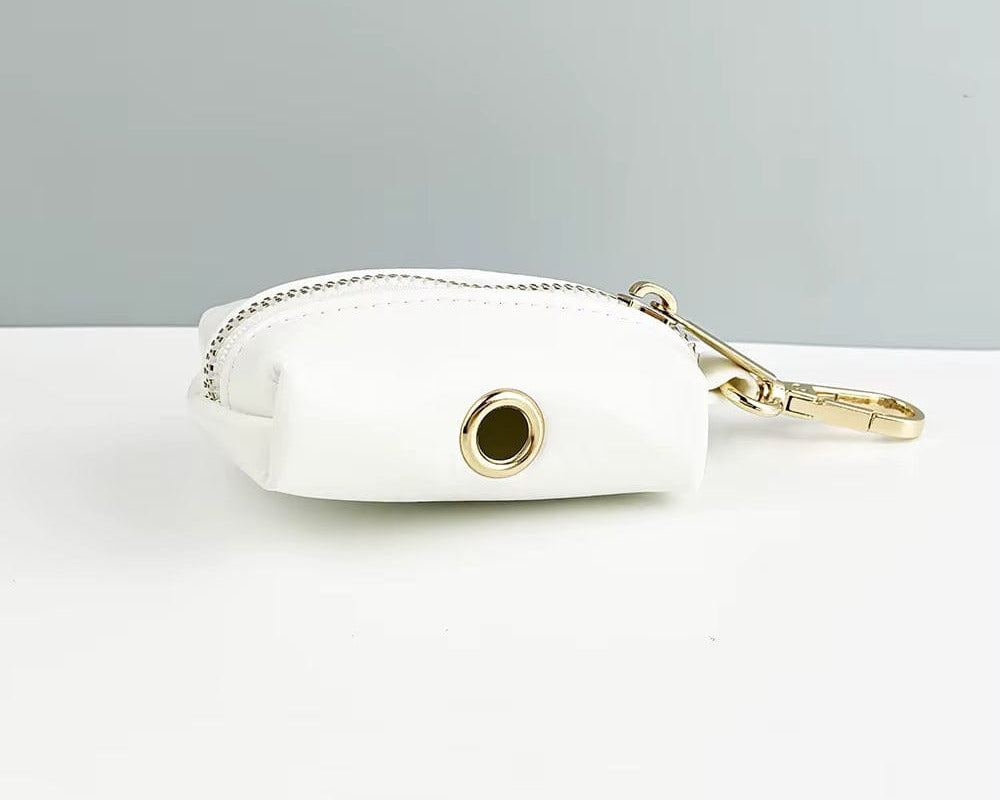 White leather poop bag holder with ring opening and carabiner clasp