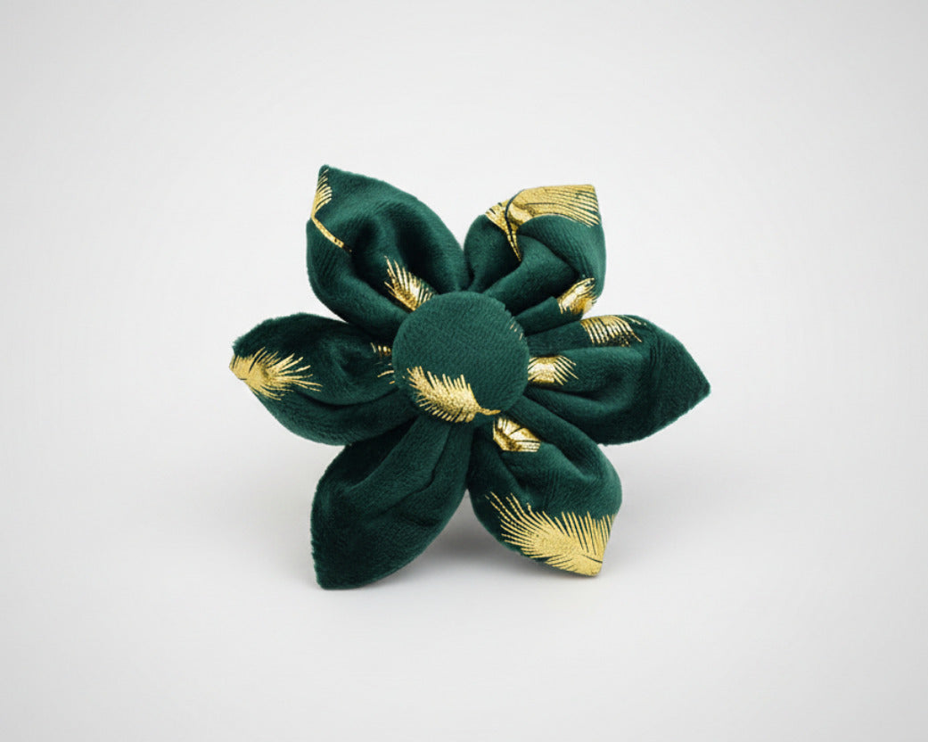 Green velvet flower accessory with gold feather pattern