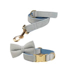 Light blue velvet dog collar and leash set with bow accent and gold hardware
