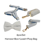 Light blue velvet harness, collar, bow, leash, and poop bag set with gold hardware