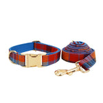 Plaid dog collar and leash set with gold-tone hardware in red-blue-orange checks