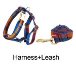 Plaid dog harness and leash set with gold-tone clips and red-blue check pattern