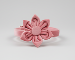Pink velvet floral bow collar with soft pink band and gold accents