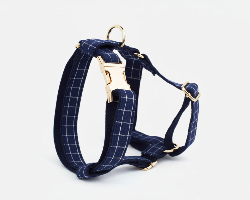 Dark blue plaid harness with gold hardware and front strap