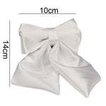 White satin pet bow tie with layered fold design and center knot